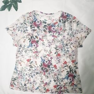 Sheer vine blouse with floral design